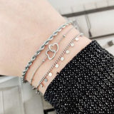 Armband Essentialistics - Goudkleur Twee Hartjes Edelstaal